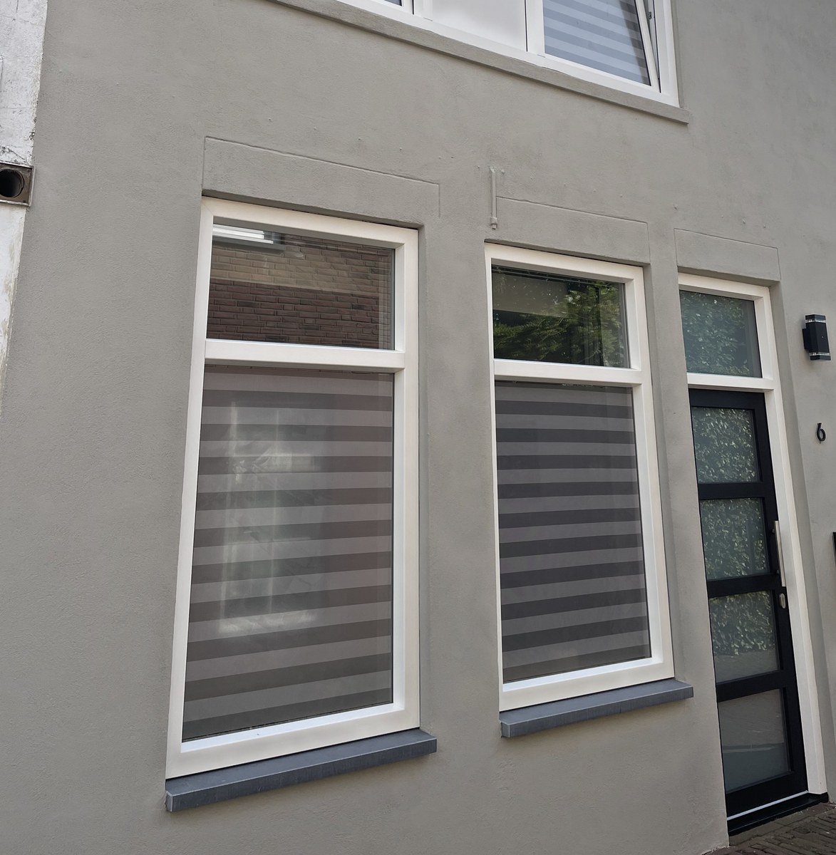 One-way-vision raambekleding bij een woonhuis